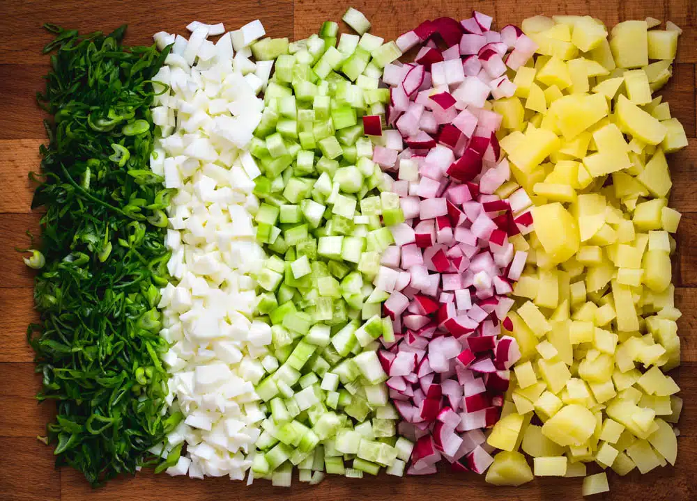 Diced vegetables on a cutting board