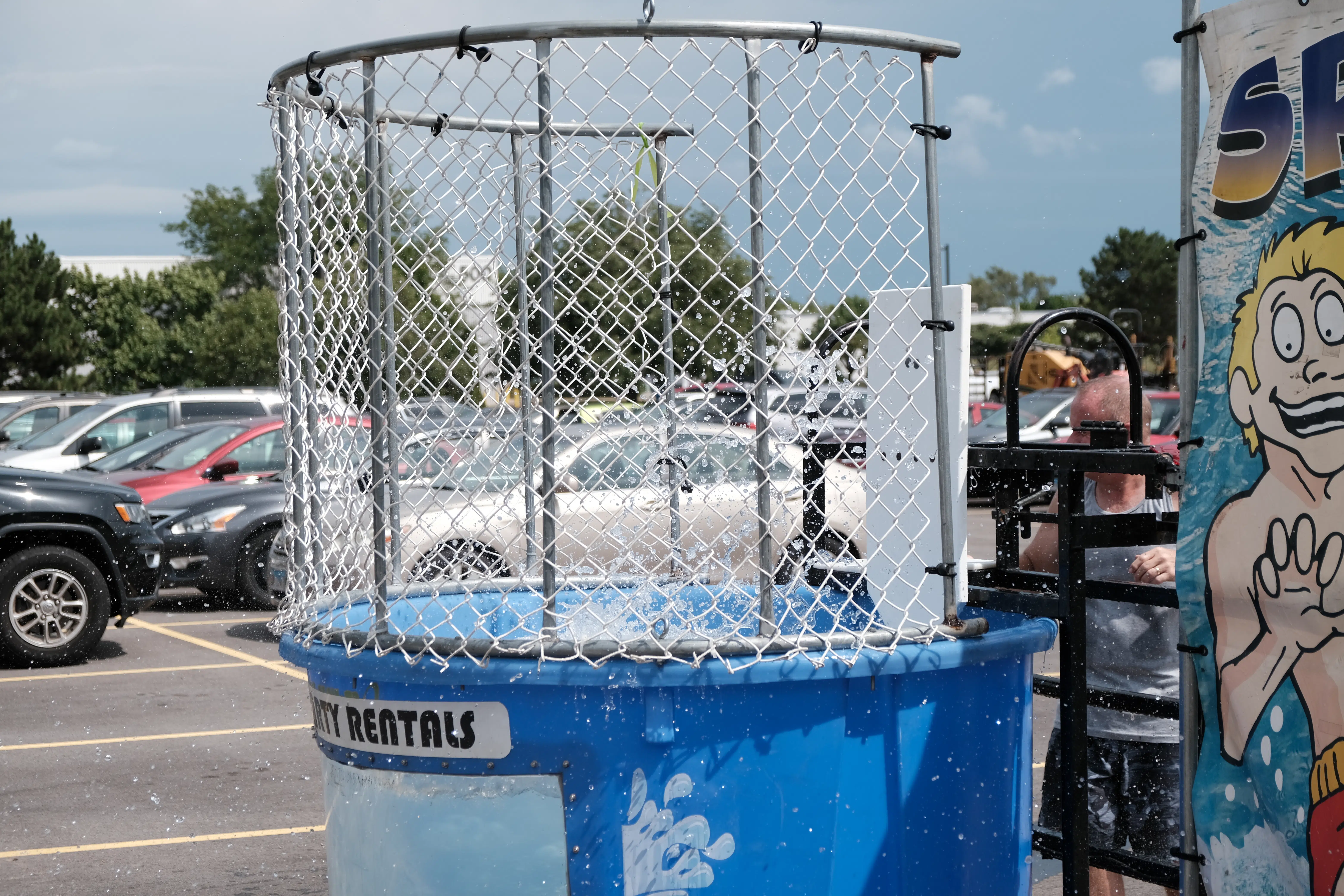 Water splashes up into the air as Simmons' Eric Johansson gets dunked.