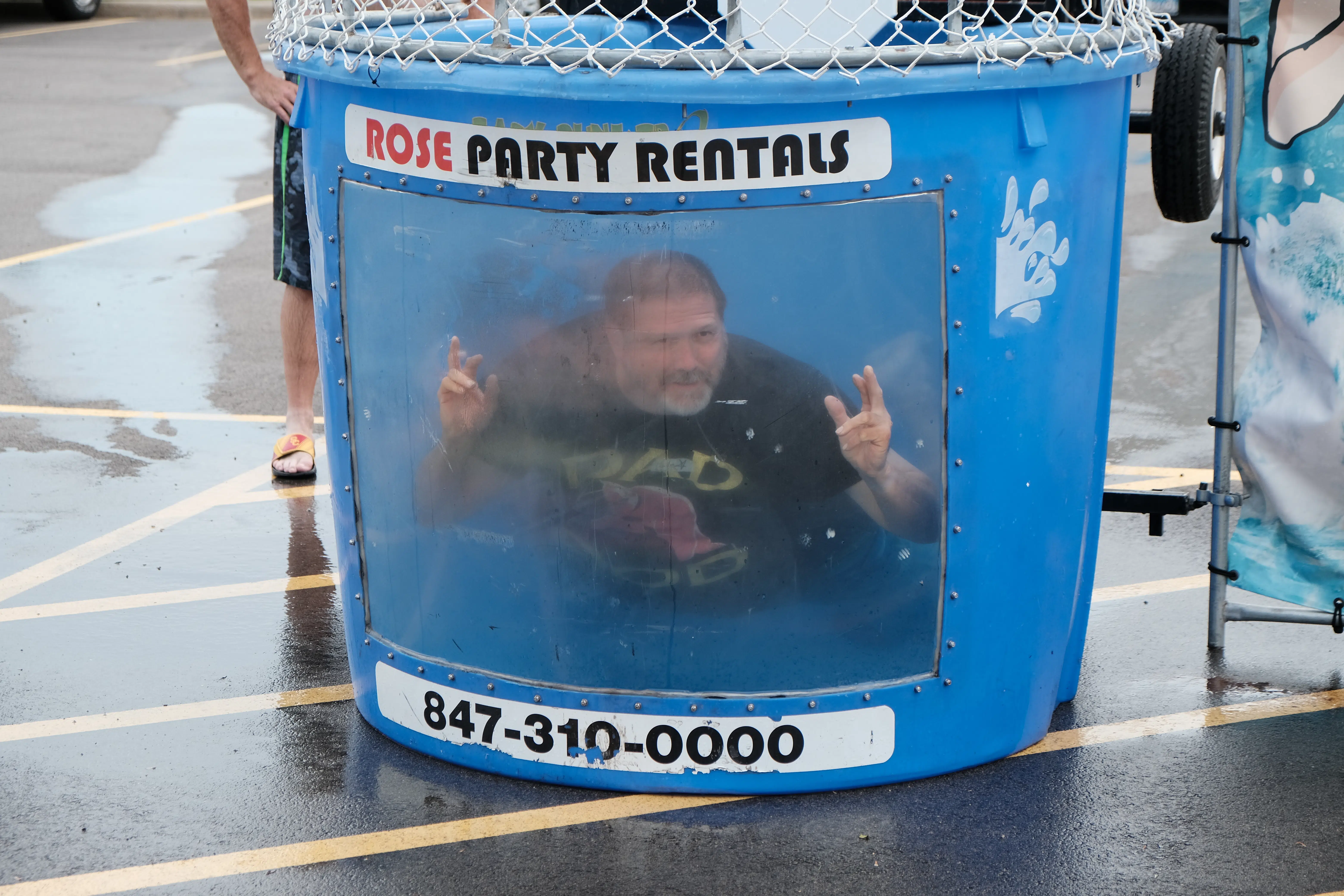 Simmons' Eric Johansson makes a funny face underwater in the dunk tank.