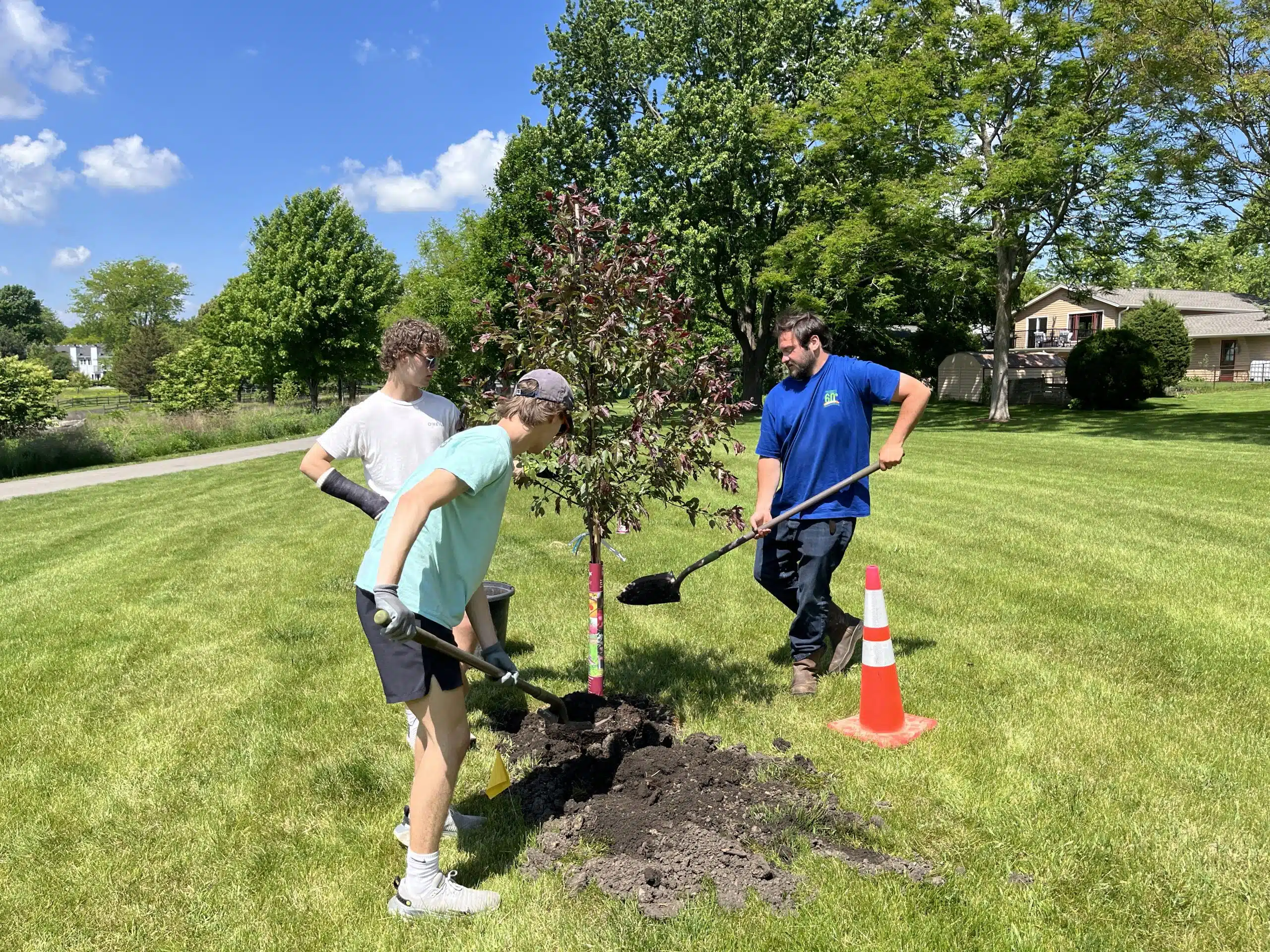 Simmons' employees cleaning up Westlake Park in Bloomingdale, IL.